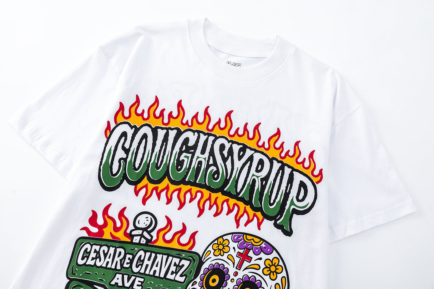 White graphic t-shirt with colorful flaming skull, street signs, and eagle back print - view 8