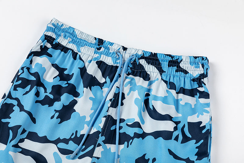 Blue camouflage drawstring shorts with white hem graphic and elastic waist - view 11
