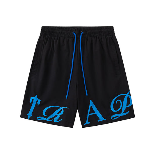 Black unisex drawstring shorts with blue letter graphic, elastic waistband, and side pockets - view 1