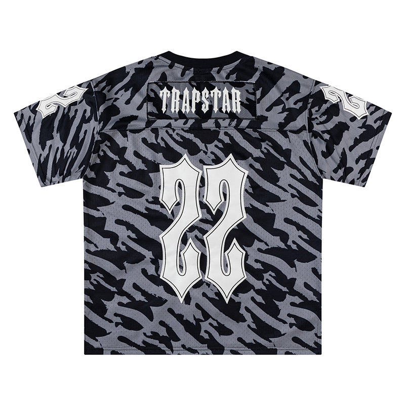 Mitchell & Ness black and gray camo NFL jersey with TRAPSTAR graphic and number 22 - view 1