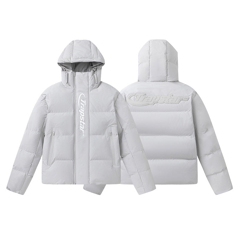 Light gray Trapstar hooded puffer jacket with front logo, full zip, quilted panels, and zippered pockets - view 1