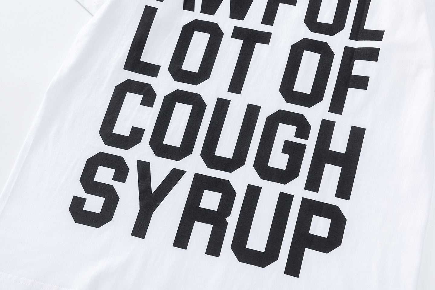 White unisex graphic T-shirt with black 'That's a Awful Lot of Cough Syrup' text print - view 2
