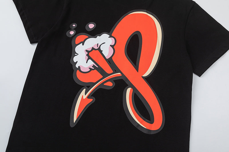 Black crew neck short sleeve graphic T-shirt with orange graffiti-style front print - view 2