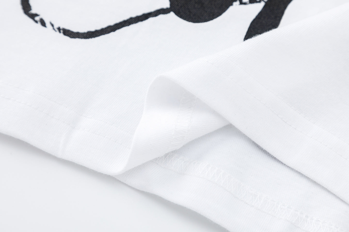 White crew neck graphic T-shirt with short sleeves and bold black printed artwork - view 2