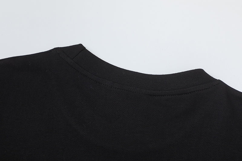 Black short sleeve crewneck T-shirt with oversized neon green graffiti-style front graphic - view 3