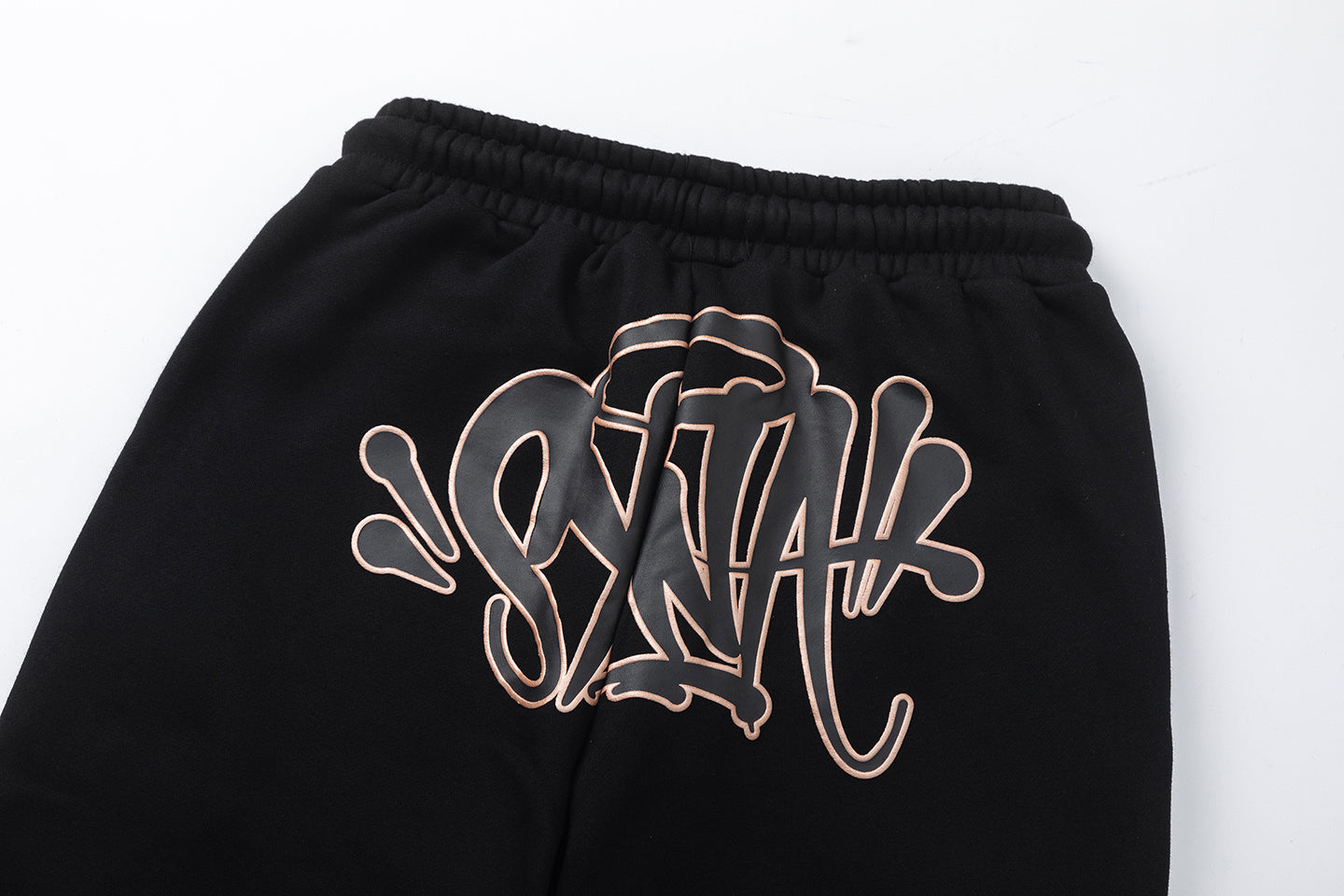 Black hooded sweatshirt and tapered jogger pants set with a graffiti-style hood graphic - view 3