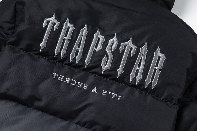 Trapstar black and gray hooded puffer jacket with quilted panels, full zip closure, and front pockets - view 3