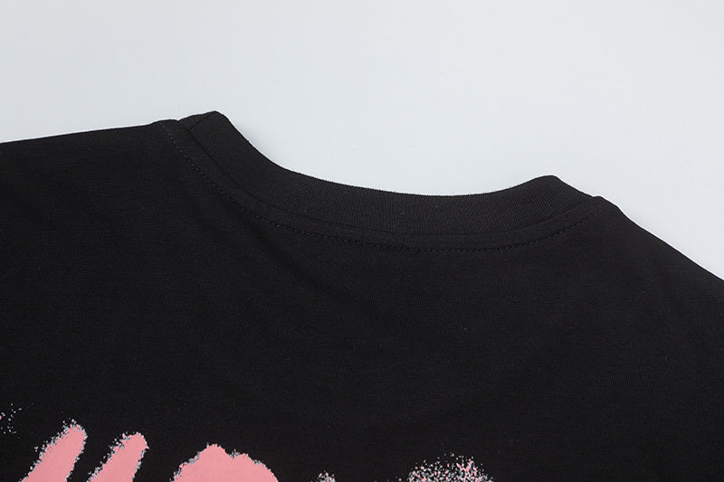 Black unisex graphic T-shirt with pink and white masked face print, crew neck, and short sleeves - view 3