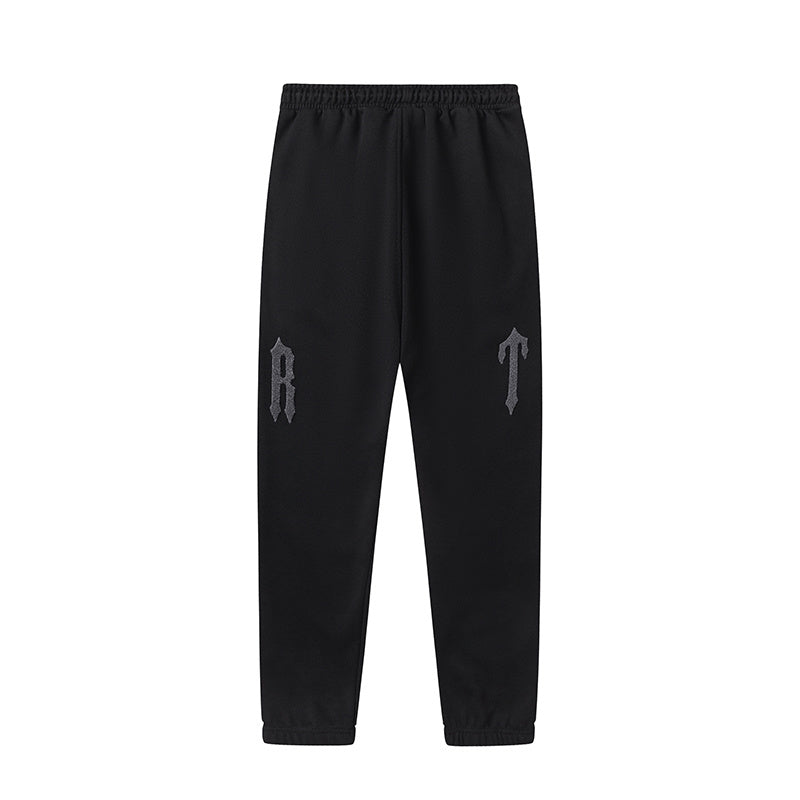 Black Trapstar graphic pullover hoodie and jogger pants two-piece tracksuit set with blue, white and gray lettering - view 3