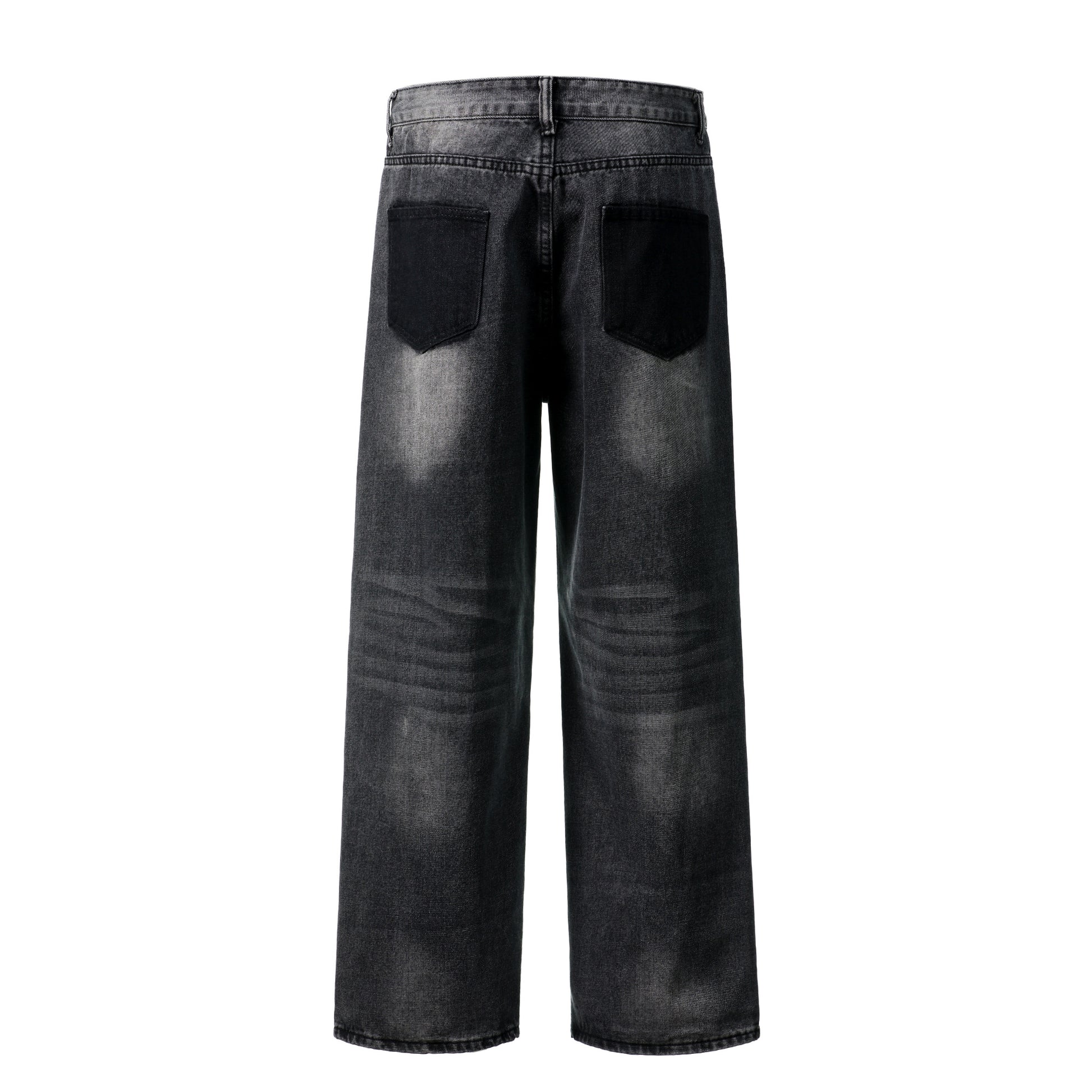 Distressed ripped jeans angled side view showing rip detail