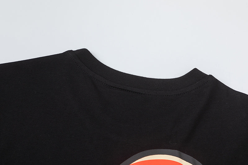 Black crew neck short sleeve graphic T-shirt with orange graffiti-style front print - view 3