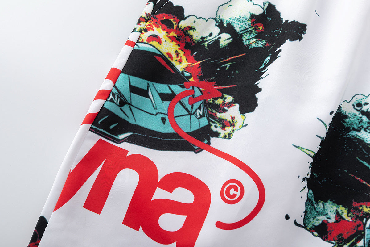White graphic shorts with colorful cars, explosions, helicopters, elastic waistband, drawstring, and side pockets - view 3