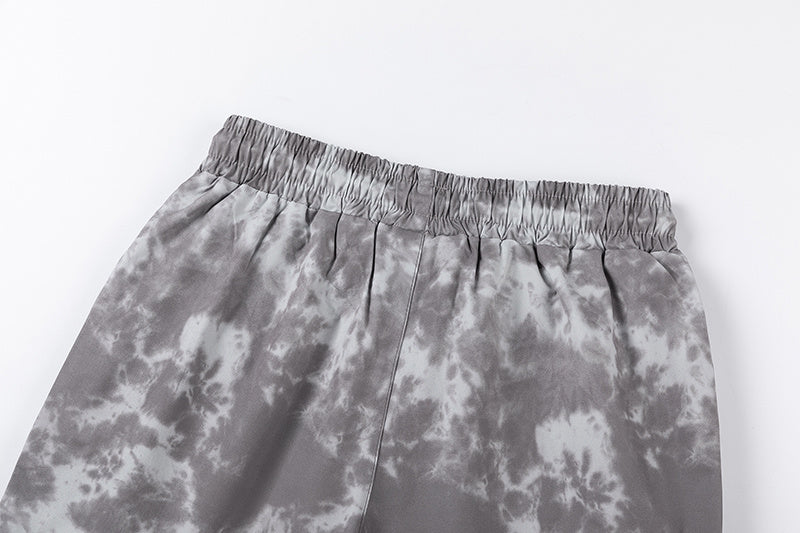 Black and gray tie-dye graphic shorts with drawstring waist and front pockets - view 4