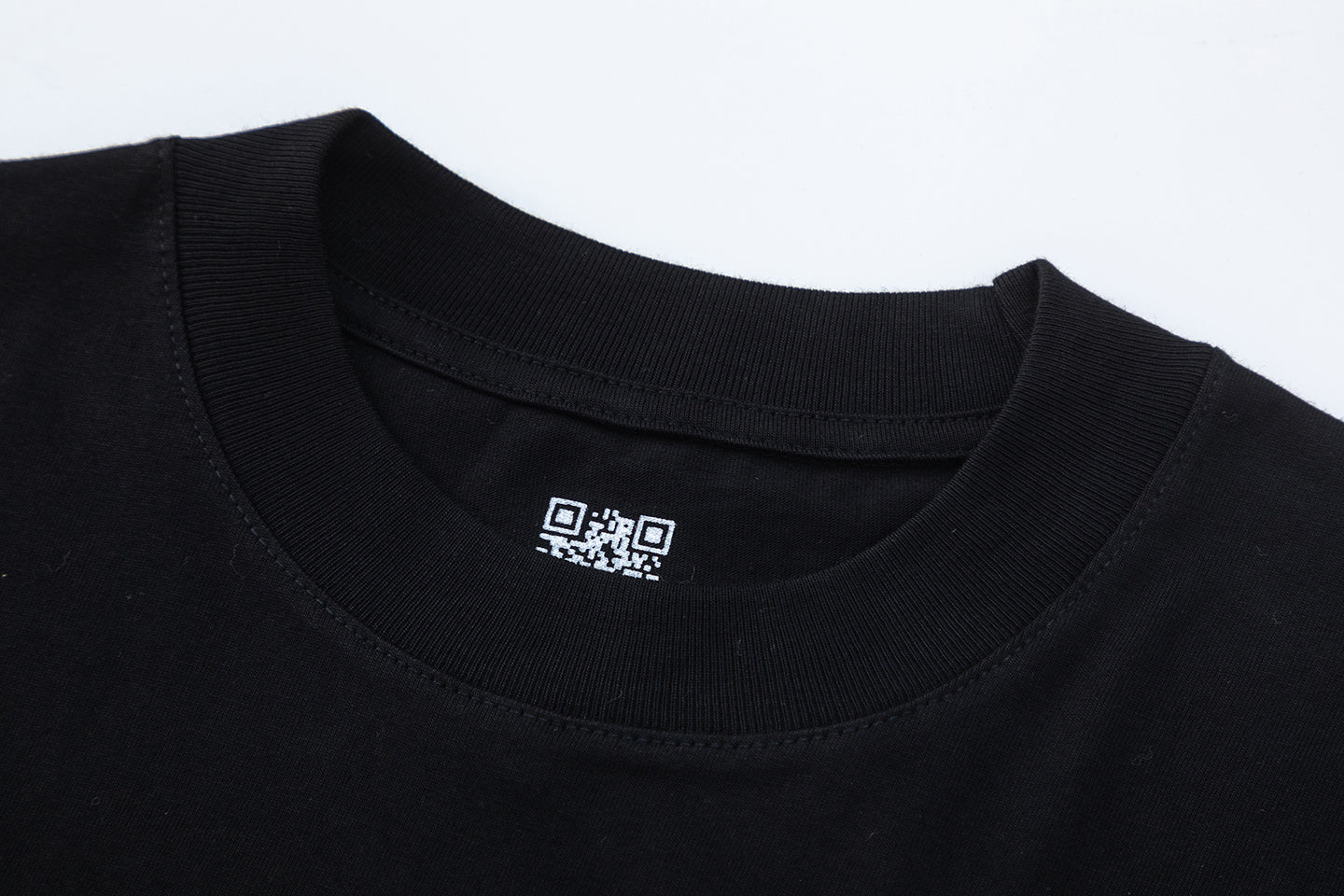 Black unisex oversized graphic T-shirt with white figure lettering print on front and back - view 4
