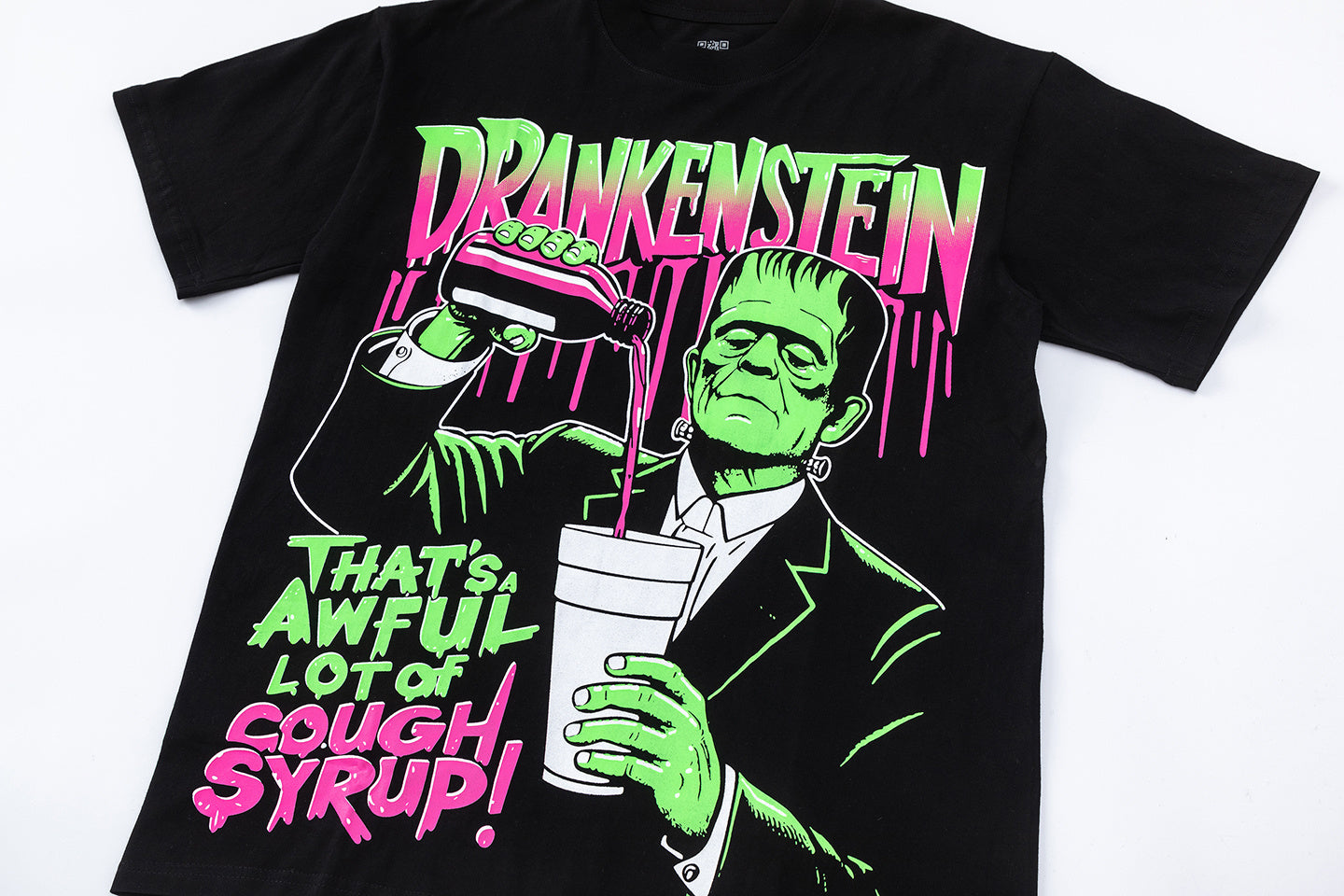 Black oversized graphic T-shirt with pink and white That's an Awful Lot of Cough Syrup slogan print - view 4