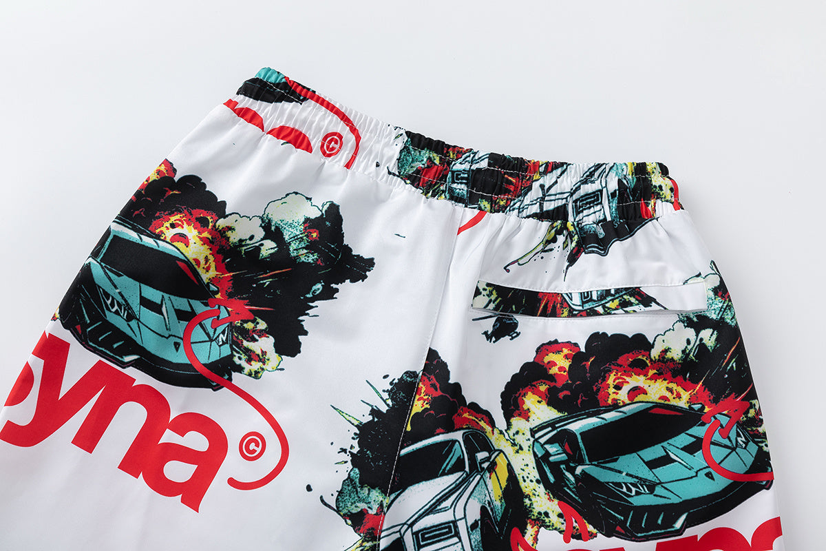 White graphic shorts with colorful cars, explosions, helicopters, elastic waistband, drawstring, and side pockets - view 6