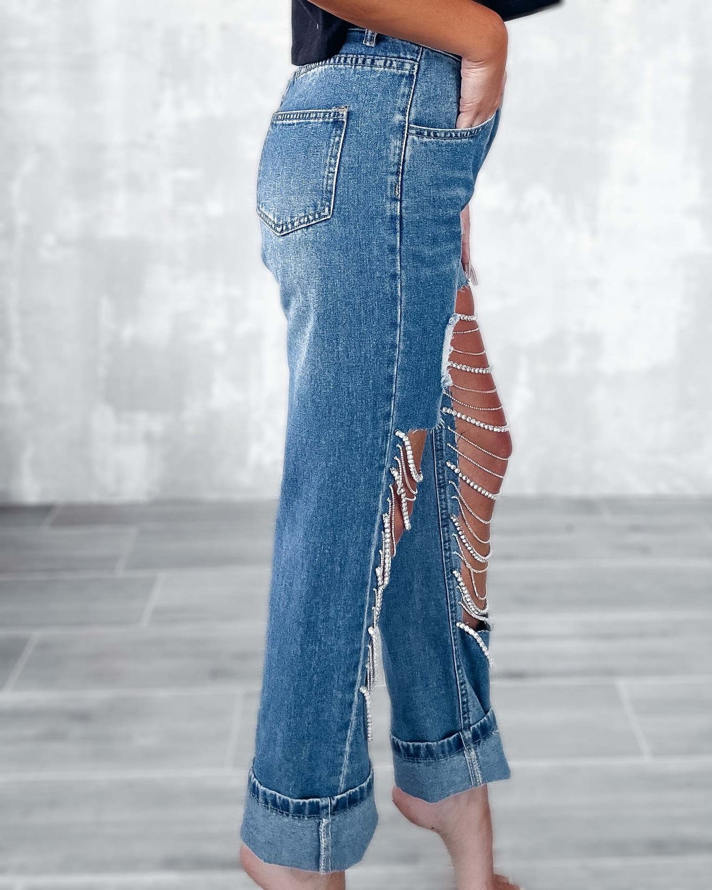 Early spring jeans with big holes for women, straight pants with chain ornaments