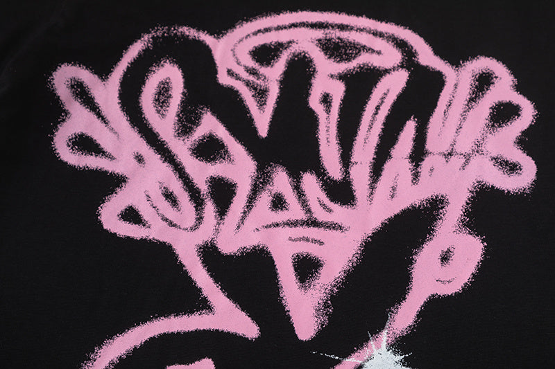 Black short sleeve graphic T-shirt with pink graffiti-style skull print - view 6