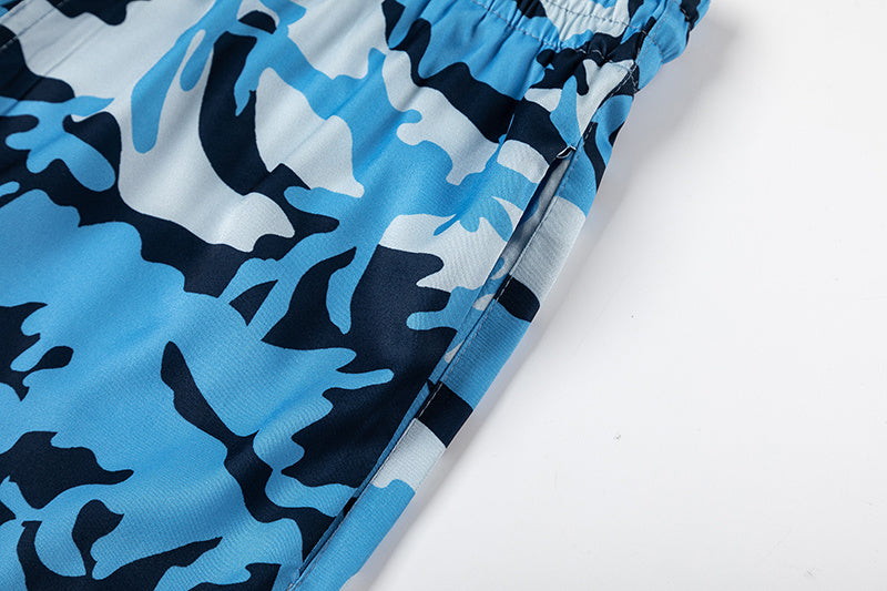 Blue camouflage drawstring shorts with white hem graphic and elastic waist - view 6