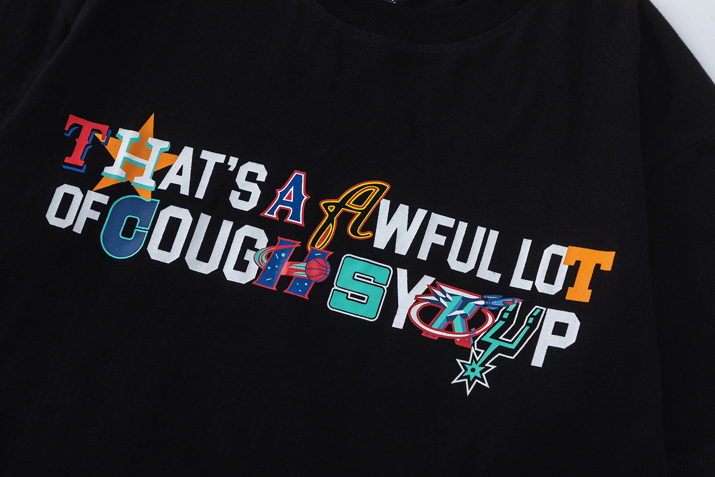 Black short sleeve graphic T-shirt with colorful basketball-inspired front and back print - view 7