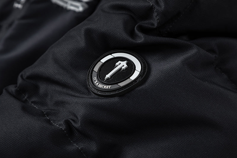Trapstar black and gray hooded puffer jacket with quilted panels, full zip closure, and front pockets - view 7