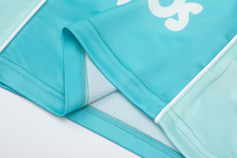 Turquoise Trapstar graphic football jersey with KidSuper Studios artwork and contrast striped panels - view 7