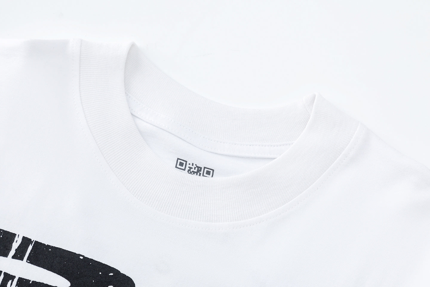 White crew neck graphic T-shirt with short sleeves and bold black printed artwork - view 7