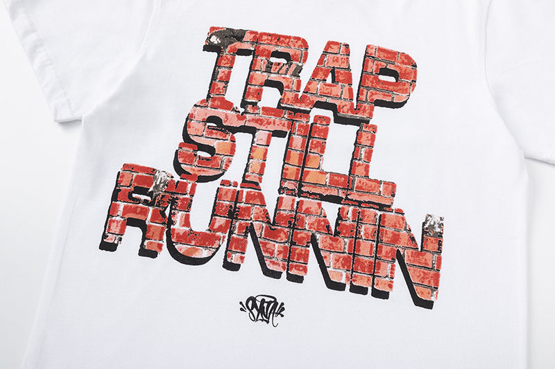 White crew neck short sleeve T-shirt with red and black brick-style Trap Still Runnin graphic - view 7
