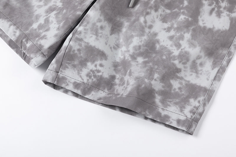 Black and gray tie-dye graphic shorts with drawstring waist and front pockets - view 7
