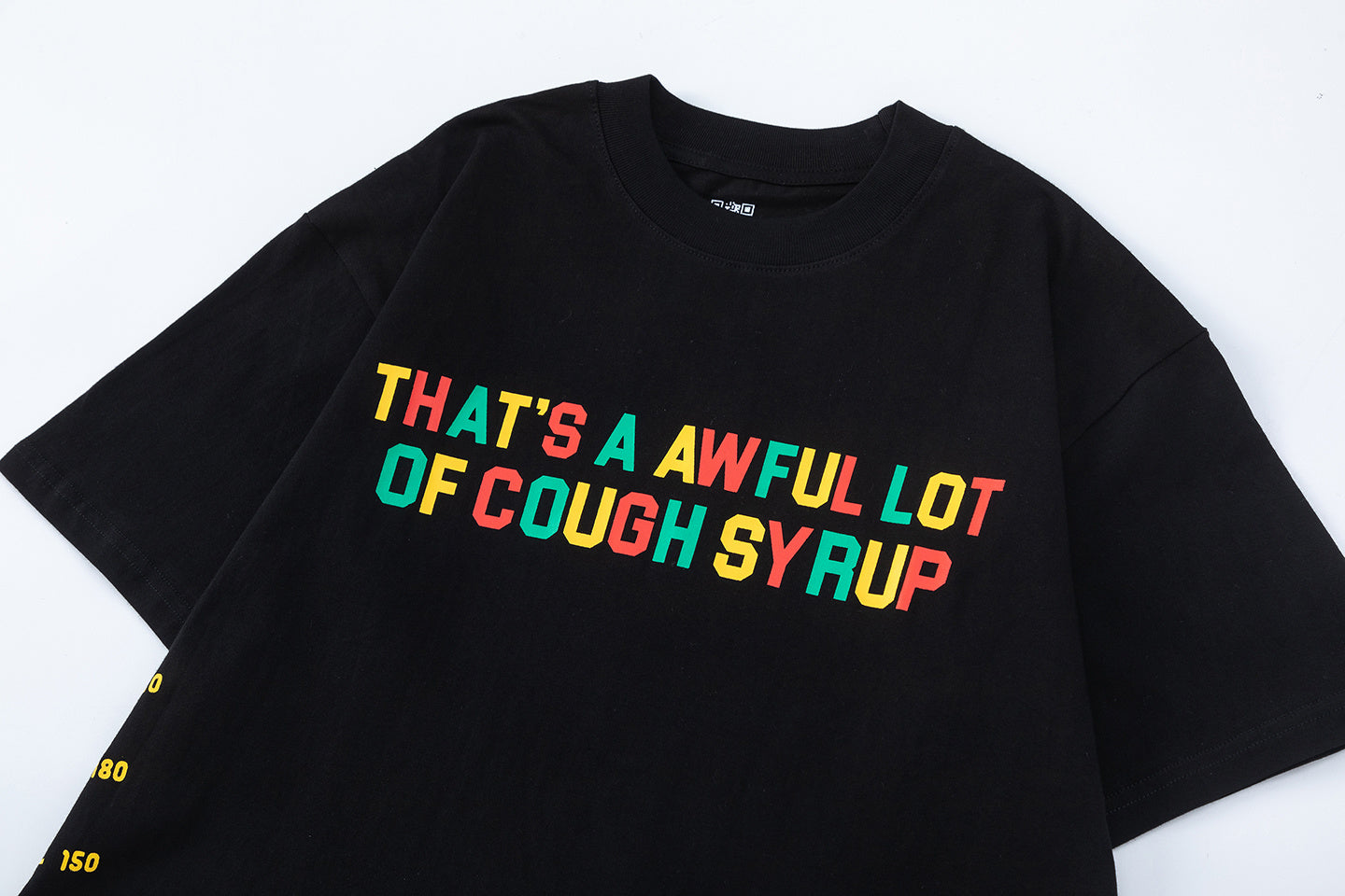 Black oversized unisex graphic T-shirt with colorful Cough Syrup text print - view 7