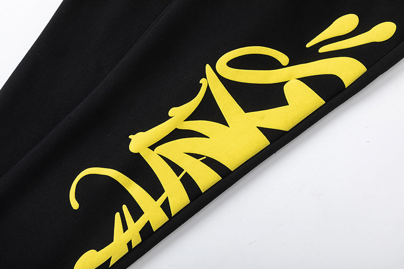 Black hoodie and joggers tracksuit set with bold yellow graffiti-style graphic print - view 8