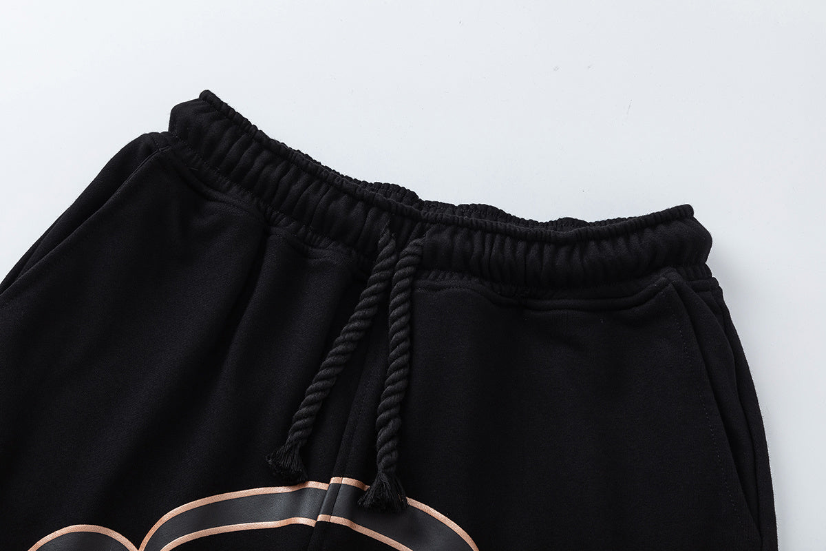 Black unisex graphic T-shirt and drawstring shorts set with outlined graffiti-style artwork - view 8