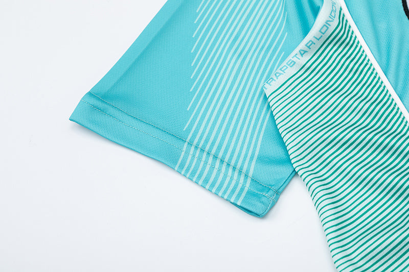 Turquoise Trapstar graphic football jersey with KidSuper Studios artwork and contrast striped panels - view 8