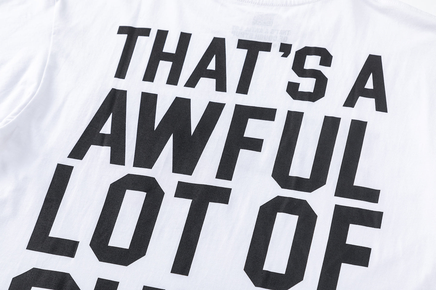 White unisex oversized graphic T-shirt with red front emblem and bold black back text - view 8