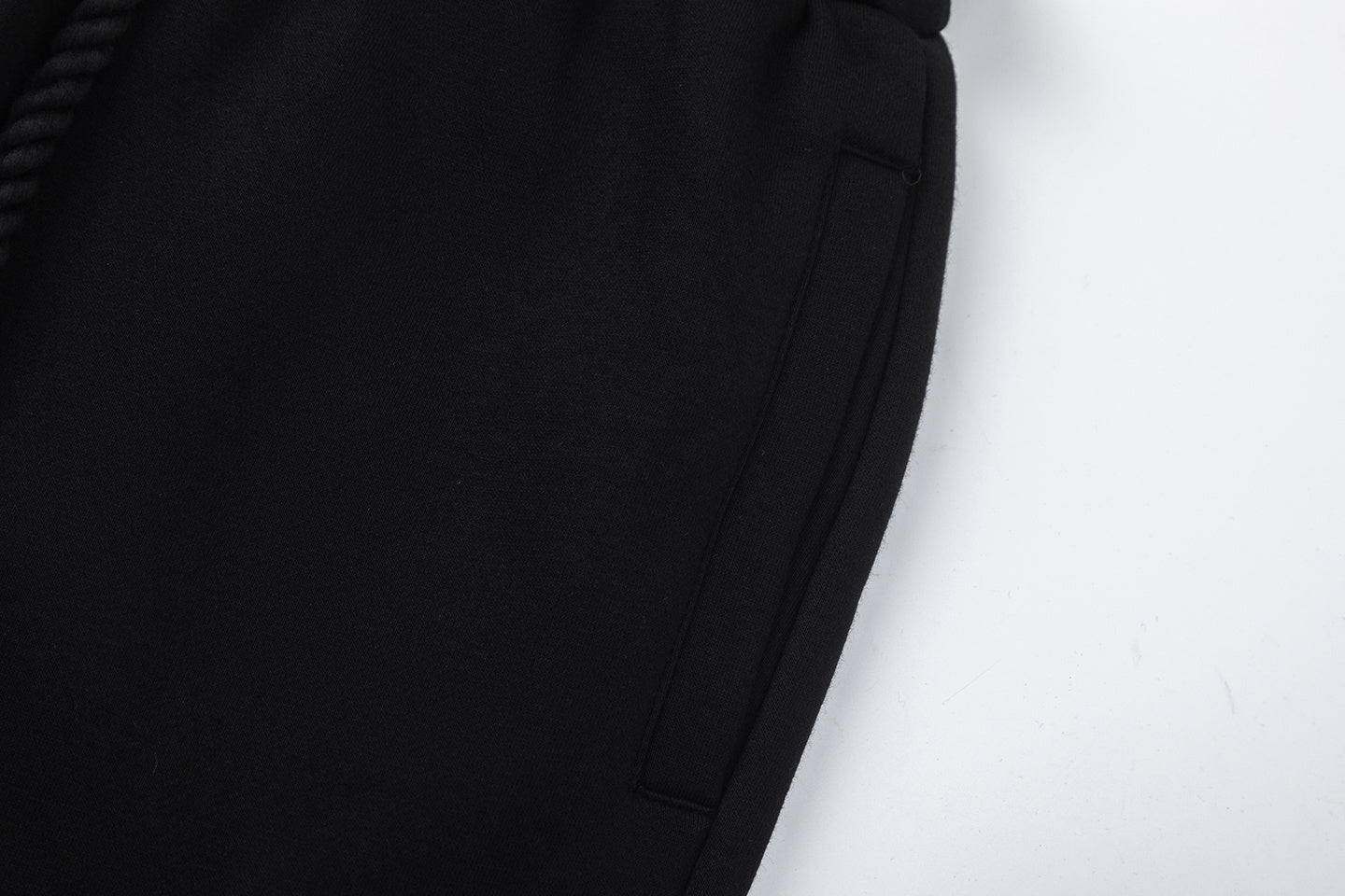 Black hooded sweatshirt and tapered jogger pants set with a graffiti-style hood graphic - view 8