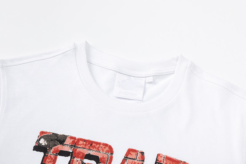White crew neck short sleeve T-shirt with red and black brick-style Trap Still Runnin graphic - view 8