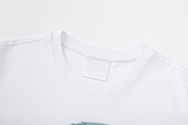 White crewneck short sleeve T-shirt with blue-gray graffiti-style chest graphic - view 9