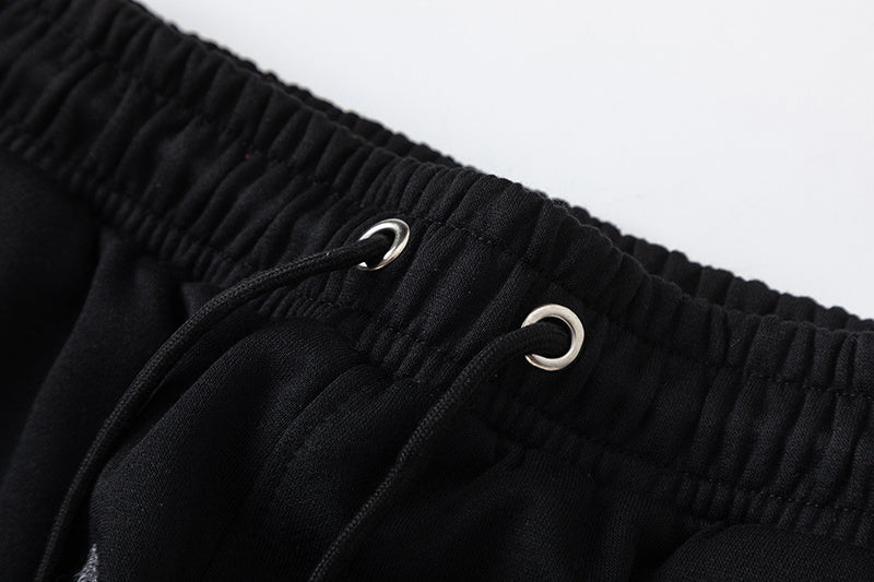 Black Trapstar graphic pullover hoodie and jogger pants two-piece tracksuit set with blue, white and gray lettering - view 9