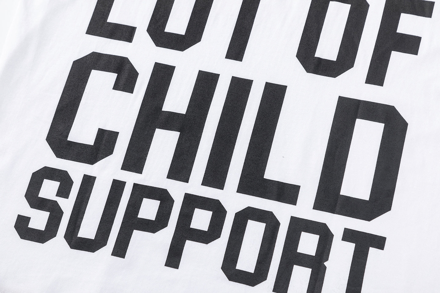 White unisex oversized graphic T-shirt with red front emblem and bold black back text - view 9