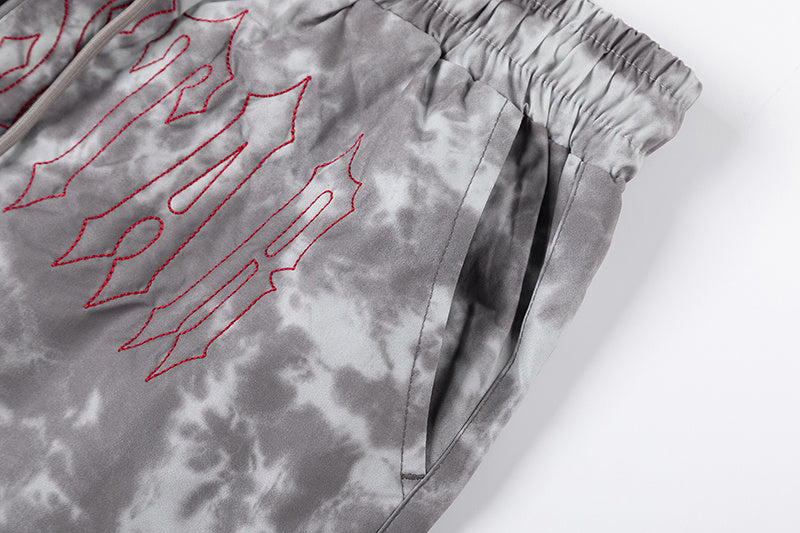 Black and gray tie-dye graphic shorts with drawstring waist and front pockets - view 9