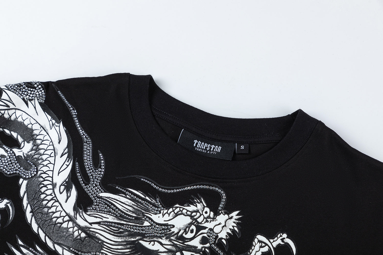 Black Trapstar unisex oversized T-shirt with white dragon graphic and rhinestone details - view 9