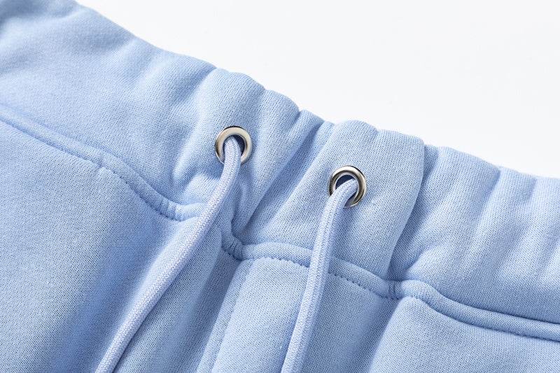 Light blue Trapstar graphic hoodie and matching joggers tracksuit set with drawstrings and zip hems - view 9