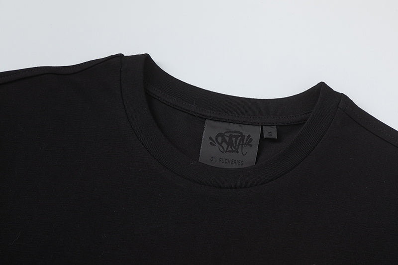 Black crew neck short sleeve graphic T-shirt with orange graffiti-style front print - view 9