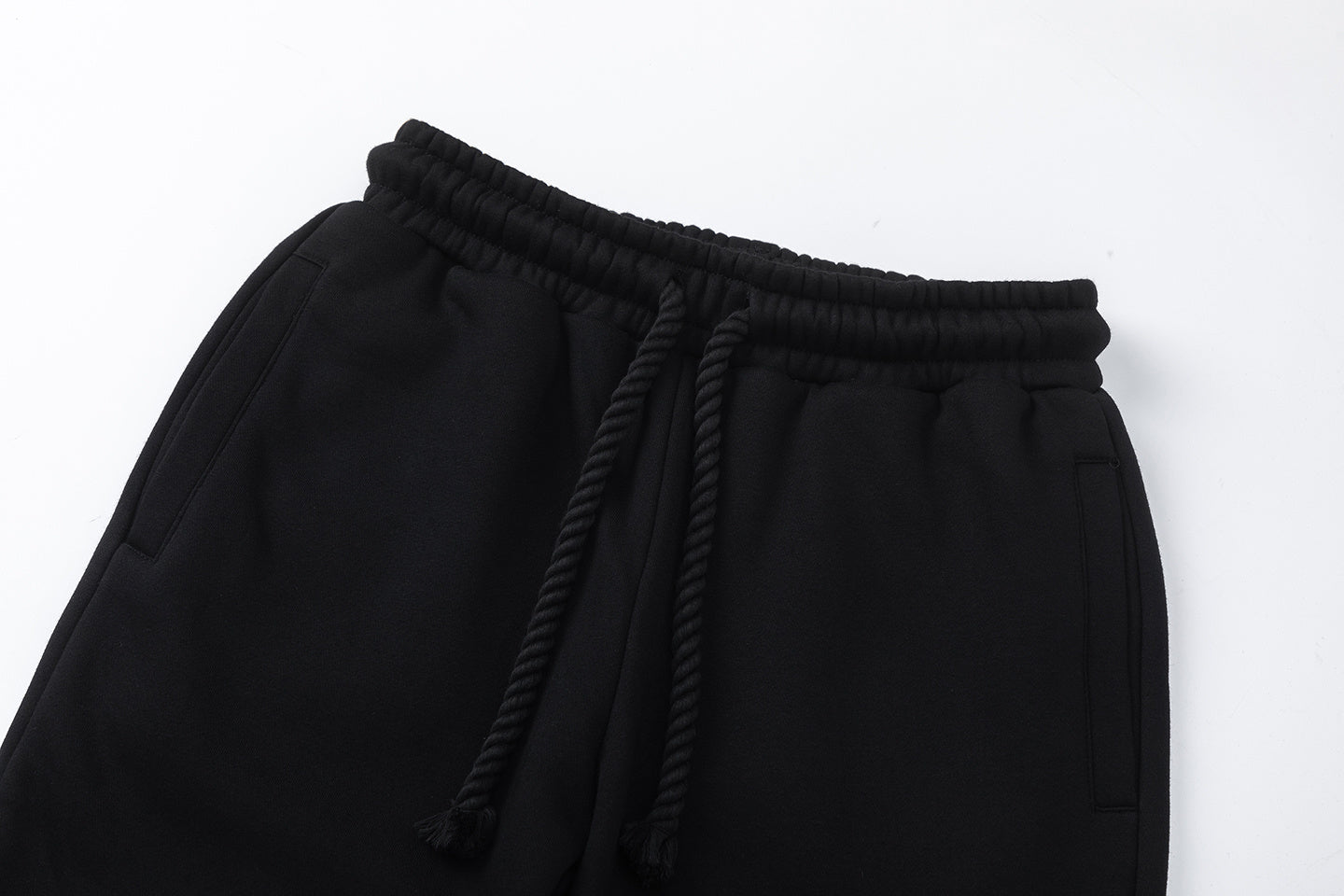 Black hooded sweatshirt and tapered jogger pants set with a graffiti-style hood graphic - view 9