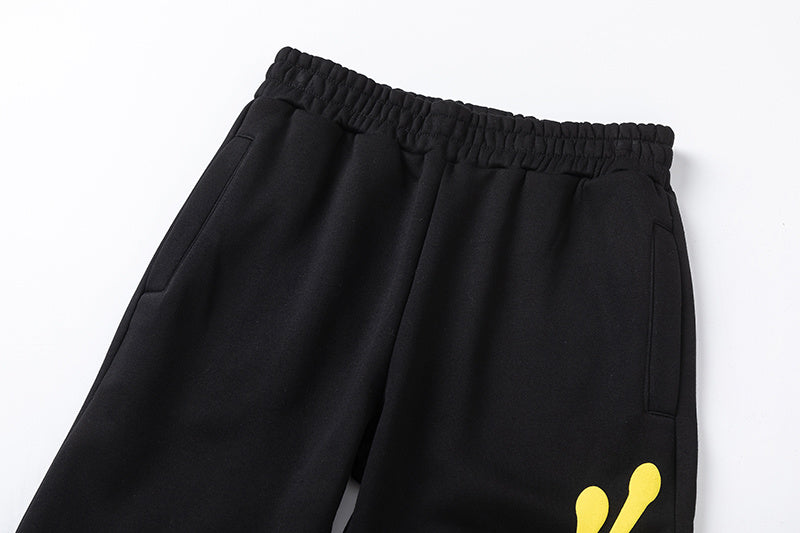 Black hoodie and joggers tracksuit set with bold yellow graffiti-style graphic print - view 9