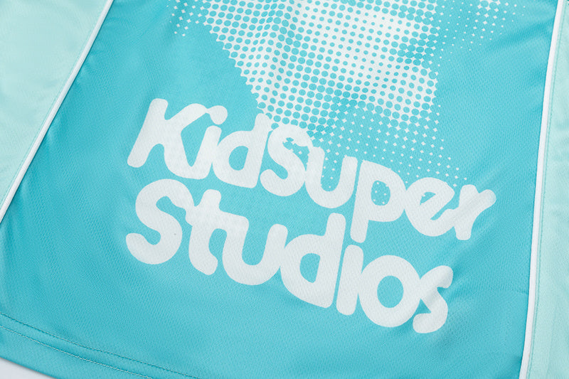 Turquoise Trapstar graphic football jersey with KidSuper Studios artwork and contrast striped panels - view 10