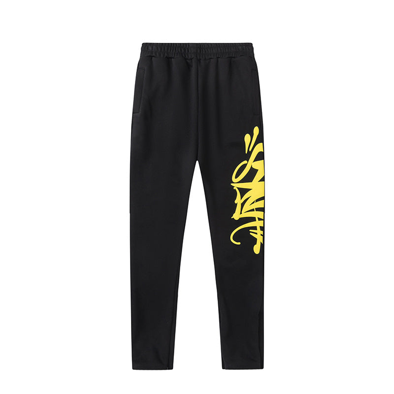 Black hoodie and joggers tracksuit set with bold yellow graffiti-style graphic print - view 10