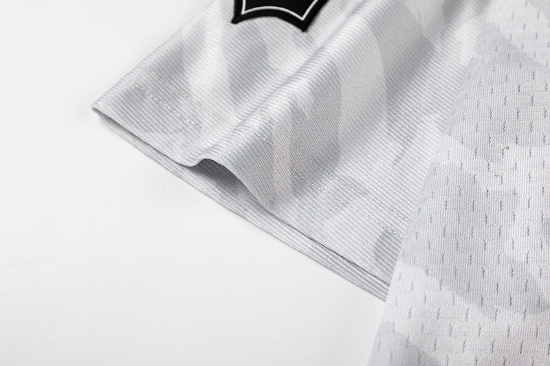 Mitchell & Ness black and gray camo NFL jersey with TRAPSTAR graphic and number 22 - view 10