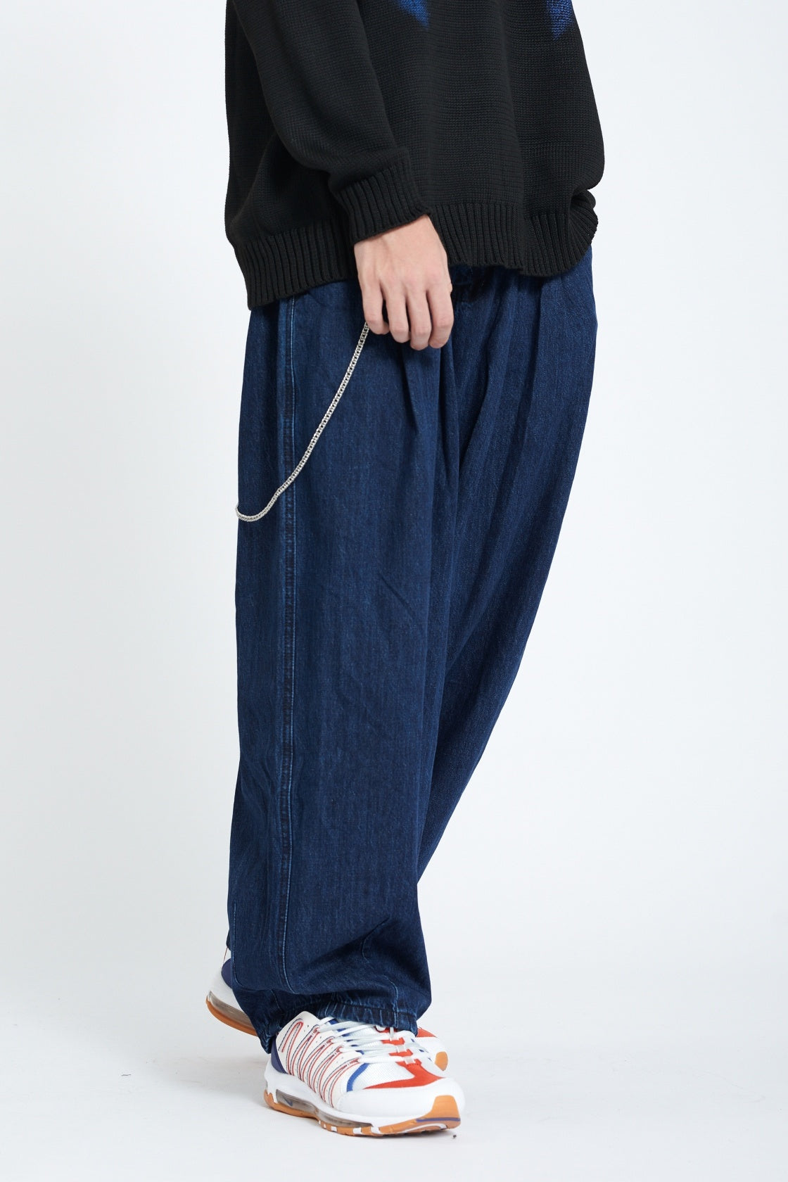 Dark indigo denim jogger side full length view