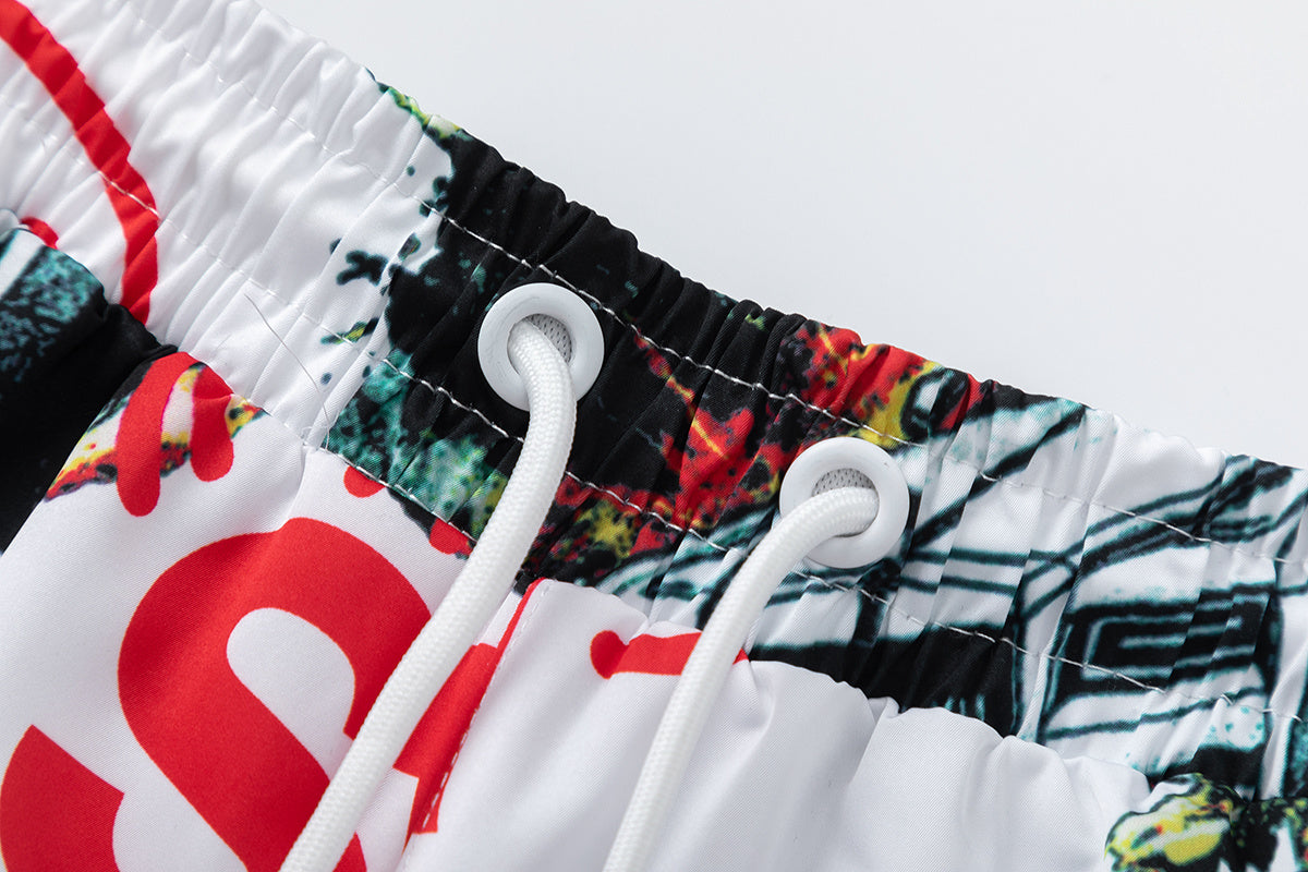 White graphic shorts with colorful cars, explosions, helicopters, elastic waistband, drawstring, and side pockets - view 10